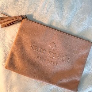 Kate spade leather clutch with tassel